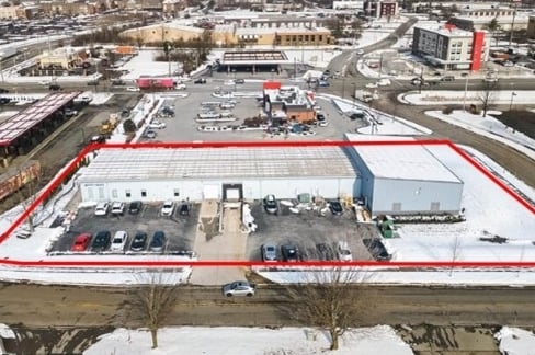 Photo of a warehouse and parking lot